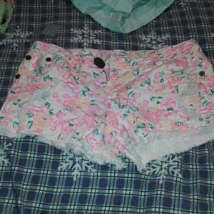 Junior pink floral distressed denim shorts